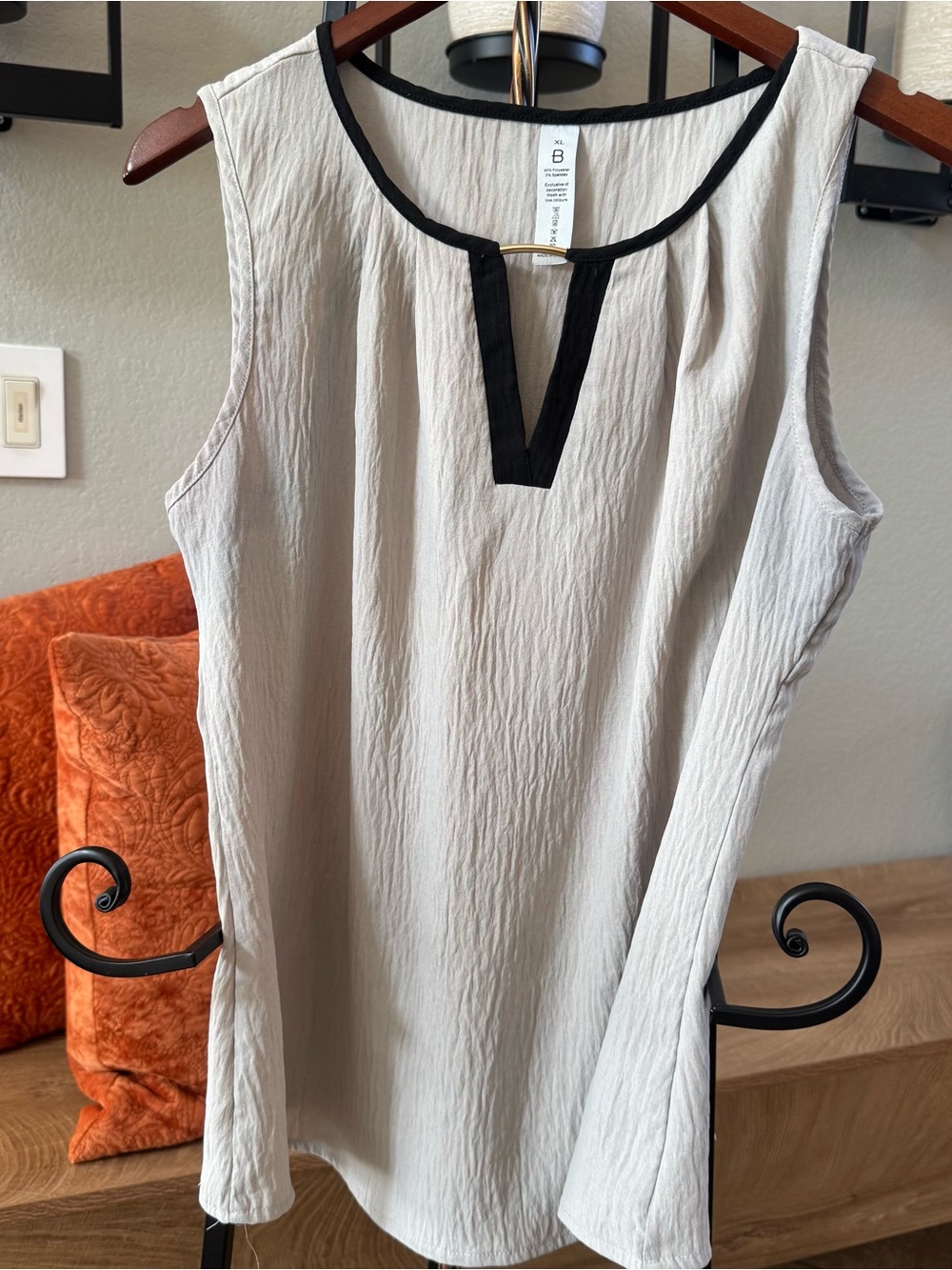 Sleeveless Cream Shell Top with Black Trim